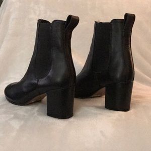 Black leather booties.